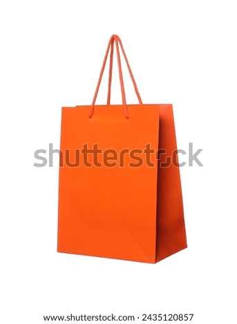 One orange shopping bag isolated on white
