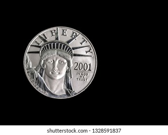 One Ounce Platinum Coin On A Black Background With Copy Space.