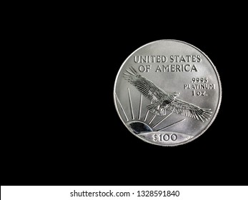 One Ounce Platinum Coin On A Black Background With Copy Space.