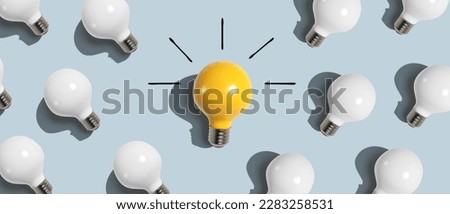One out unique idea light bulb concept - Flat lay