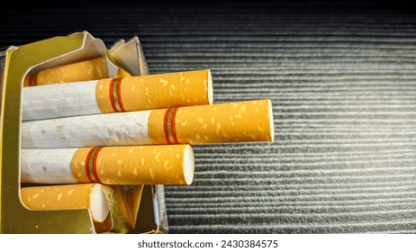 one pack of cigarettes with a black background