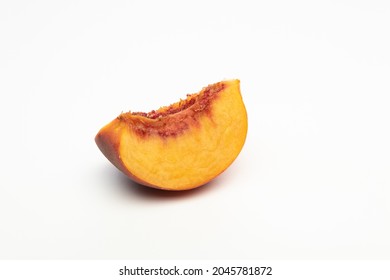 One Peach Wedge, Isolated On White Background