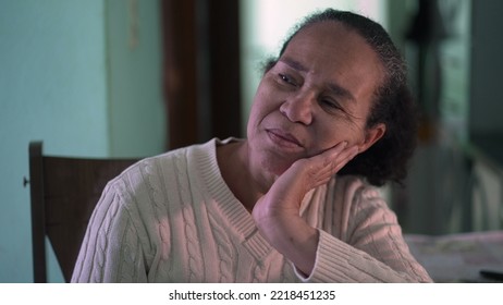 One Pensive South American Senior Woman Thinking. A Contemplative Black Woman Portrait Face