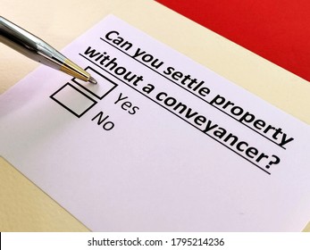 One person is answering question about hiring conveyancer. - Shutterstock ID 1795214236