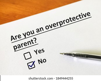 One Person Is Answering Question About Parenting. The Person Is Thinking If He Is An Overprotective Parent.