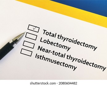 One Person Is Answering Question About Thyroid Pathology.The Person Chooses Total Thyroidectomy. 