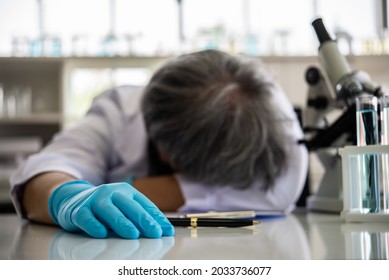 One Person Senior Doctor Work Hard Sleep On Table. Professional Biology Doctor Over Work In Lab. People Lifestyle: Adult  Hopeless People Working In Test Lap Hospital.