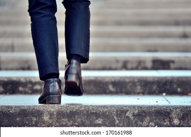 One person in stairs, winter / wet