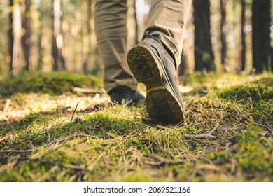 one person walking in the woods. Speed-hiking shoes closeup - Powered by Shutterstock