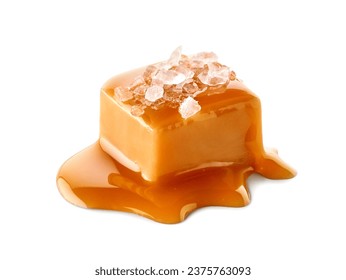 One piece of salty caramel candy topped with melted sauce and salt crystals isolated on white background, close-up