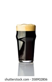 One Pint Glass Of Dark Beer Isolated On White Background