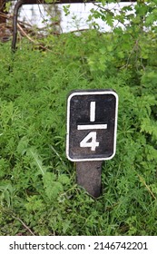 One Quarter Sigh On Grass Along Side Of Canal Towpath 