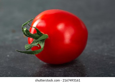 One Raw Cherry Tomato - Close Up View