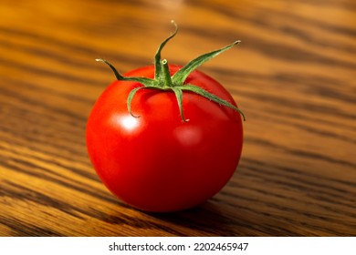 One Raw Cherry Tomato - Close Up View