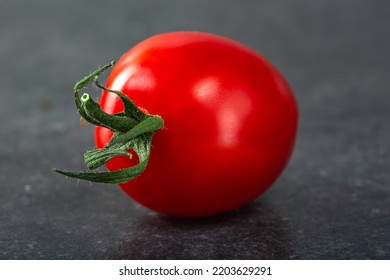 One Raw Cherry Tomato - Close Up View