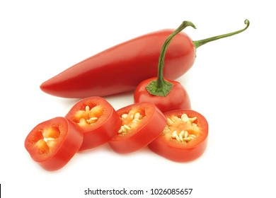 One Red Jalapeno Pepper And A Cut One On A White Background