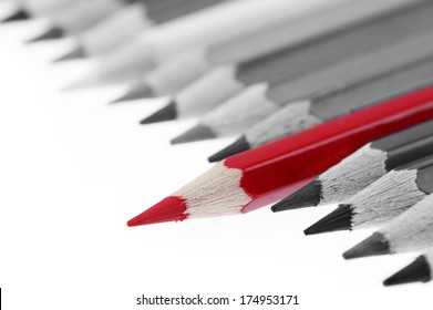 One Red Pencil Standing Out From Others