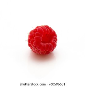One red raspberry isolated on white background