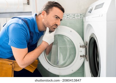 One Repairman Fixing Malfunctioning Kitchen Oven Problem