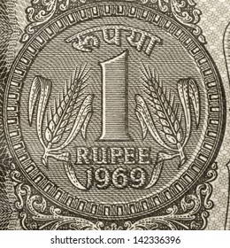 One Rupee Coin Symbol On The Note