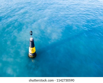 One Safety Buoy Marker For Marine Ships In The Sea Water Remote Navigation Abstract Concept