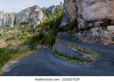 One of a series of sharp bends in the road coming down a steep cliff in the Tarn Gorge.