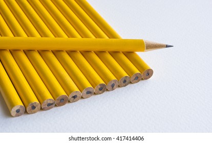 One sharpened yellow pencil outstanding the blunt ones/selective focus For business   education concept 