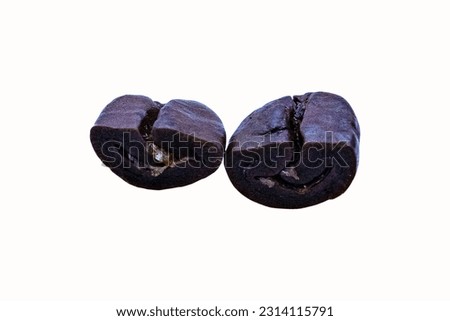 One shiny fresh roasted on top coffee beans brown damaged cut in half isolated on white background cutout. Most traded agricultural commodities in world. Coffee contains caffeine refreshing body.