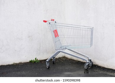 One Shopping Trolley Left Alone In Supermarket Car Park Uk