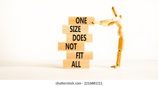 One Size Does Not Fit All Symbol. Concept Words One Size Does Not Fit All On Wooden Blocks. Businessman Hand. Beautiful White Background. One Size Does Not Fit All Business Concept. Copy Space.