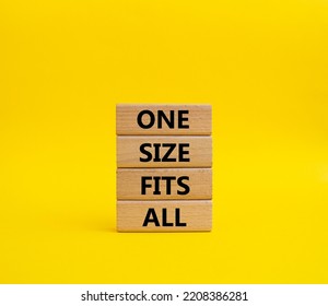 One Size Fits All Symbol. Concept Words One Size Fits All On Wooden Blocks. Beautiful Yellow Background. Business And One Size Fits All Concept. Copy Space.