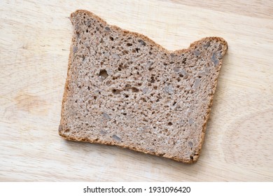 One slice of brown bread 