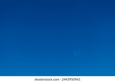 One small cloud in the blue sky.