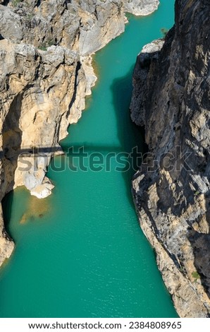 One of the sources of the turquoise Goksu river from a high point in Mersin, Turkey. Seen from a high vantage point, this river reveals a fascinating mystery with its uncertain depth.