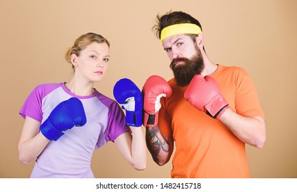 One Spirit, One Team, One Win. Punching, Sport Success. Sportswear. Fight. Training With Coach. Happy Woman And Bearded Man Workout In Gym. Knockout And Energy. Couple Training In Boxing Gloves.