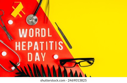 One stethoscope,pills,yellow-red ribbon, glasses,surgical instruments, palm leaf and wooden letters with the lined phrase world hepatitis day lie on the left on a red-yellow background with copy space - Powered by Shutterstock