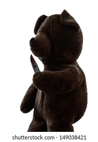 one  strange killer teddy bear holding bloody knife  in silhouette white background