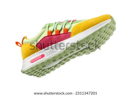 One stylish colorful sneaker isolated on white