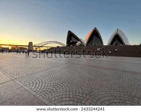 One sunset, Opera House and The Sydney Harbour Bridge