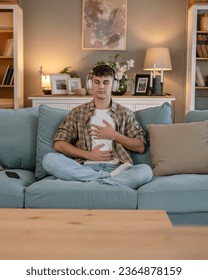 one teenager man young caucasian male use headphones for online guided meditation practice mindfulness yoga with eyes closed at home real people self care manifestation concept copy space generation Z - Shutterstock ID 2364878159
