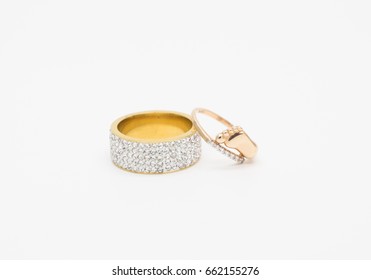 One Thick Gold Ring Embedded With Cubic Zirconia In Five Rows And One Gold Ring With Diamonds For Wedding And Child Birth