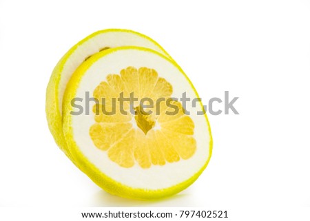 one thin slice of ripe grapefruit on a white background.
