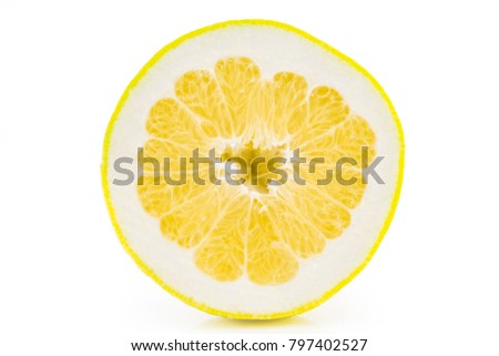 one thin slice of ripe grapefruit on a white background.