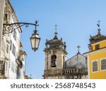 One of the two bell towers of St. Bartholomew church in the historic district of Coimbra.