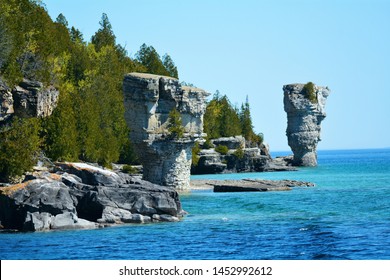 One of the two "flowerpot" rock formations located on Flowerpot Island, just north of Bruce Peninsula in Lake Huron, Ontario, Canada. - Shutterstock ID 1452992612