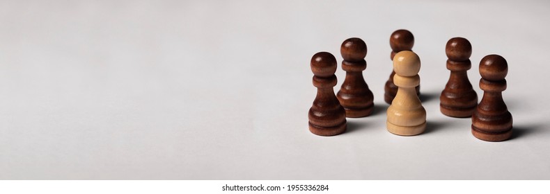 One unique pawn outstanding from many opposits. Concept of individual, different, standout, original. Banner with copy space for text.