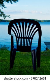 One Vacant Place Available, Empty Chair By A Lake