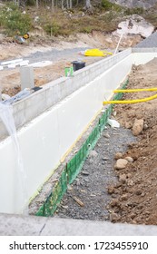 One Wall Of Foundation Of Nordic Family House From Inside During Stage Of Insulating And Filling