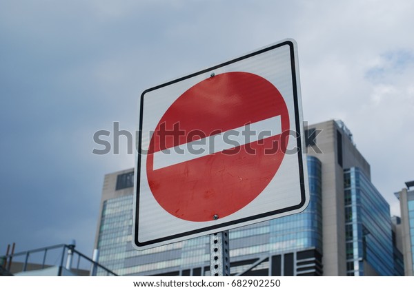 One Way / No Entry Signs On Street With Sky - City Road\
Red Symbol 