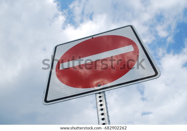 One Way / No Entry Signs On Street With Sky - City Road\
Red Symbol 